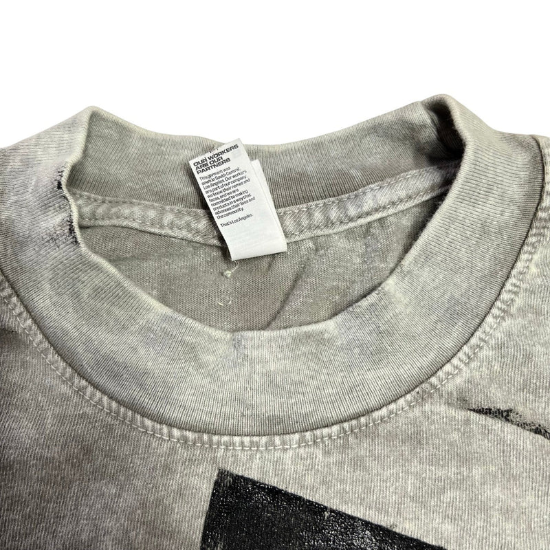 Five Star Silver acid-wash grey crewneck t-shirt with a distressed black star graphic and internal garment tag.