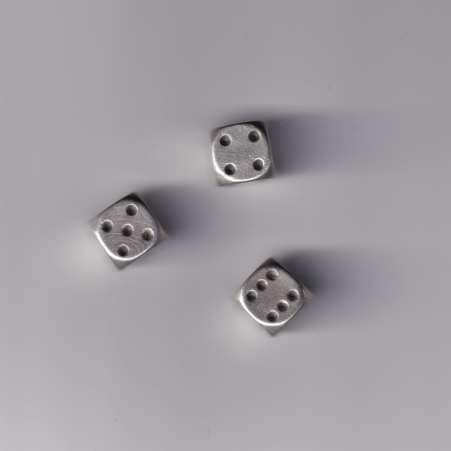 3 mini sterling silver dice